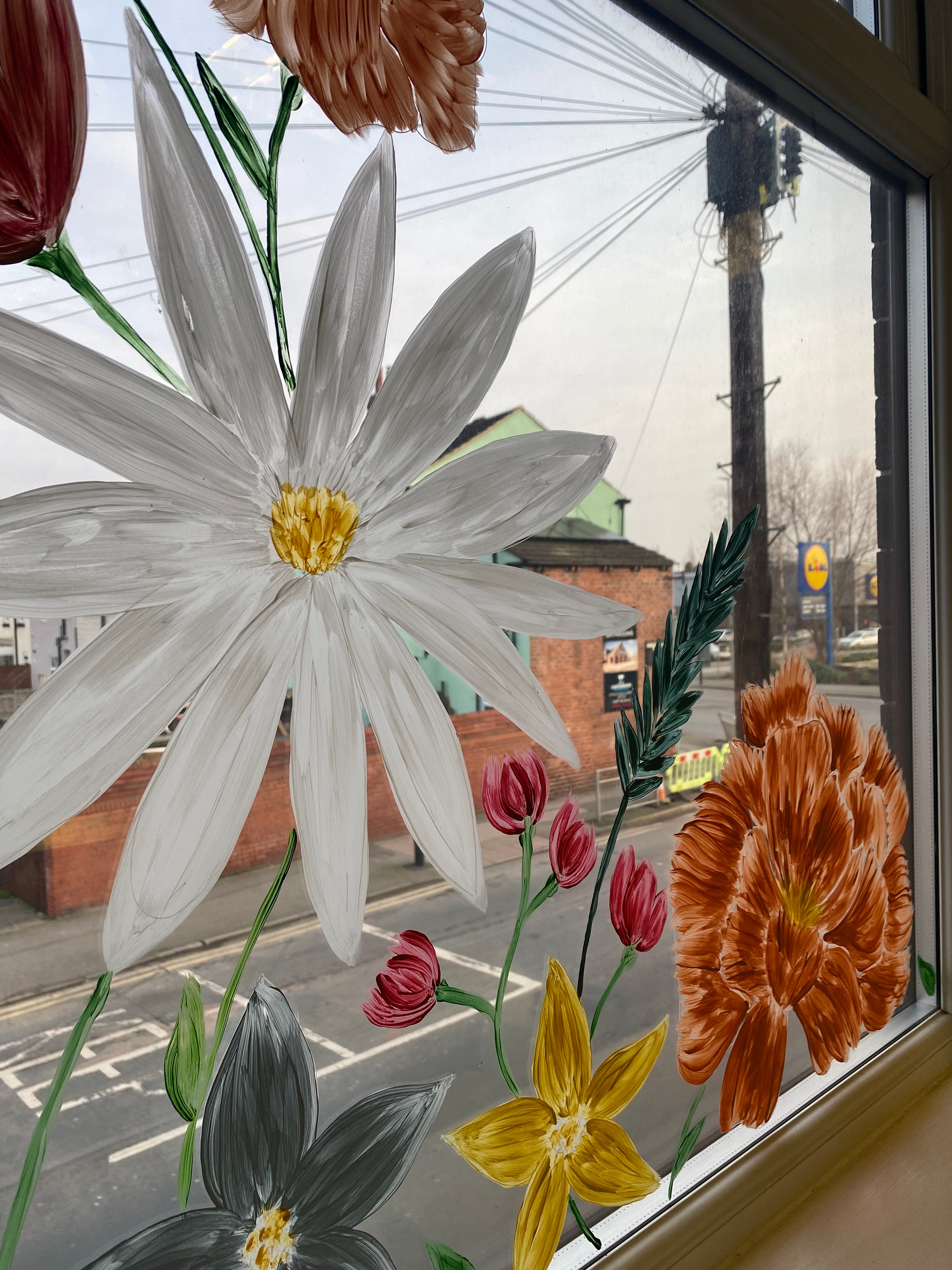 Custom Hand-Painted Window Art | Bespoke Window Designs for Homes & Shops & Business