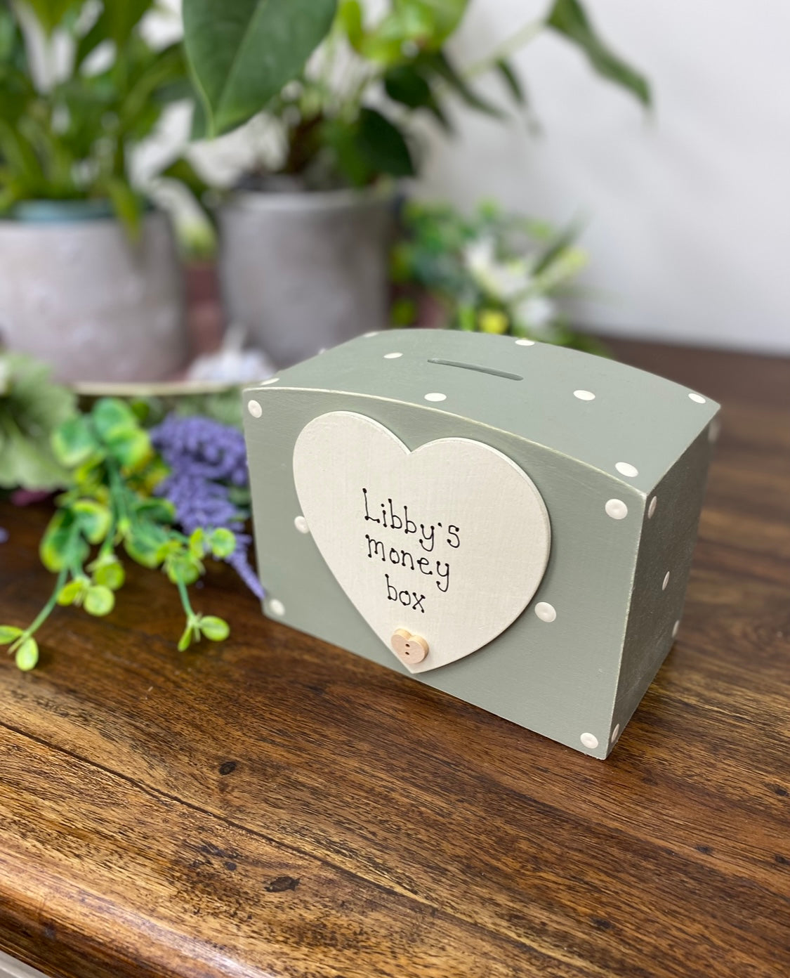 Personalised spotty wooden money box with heart.