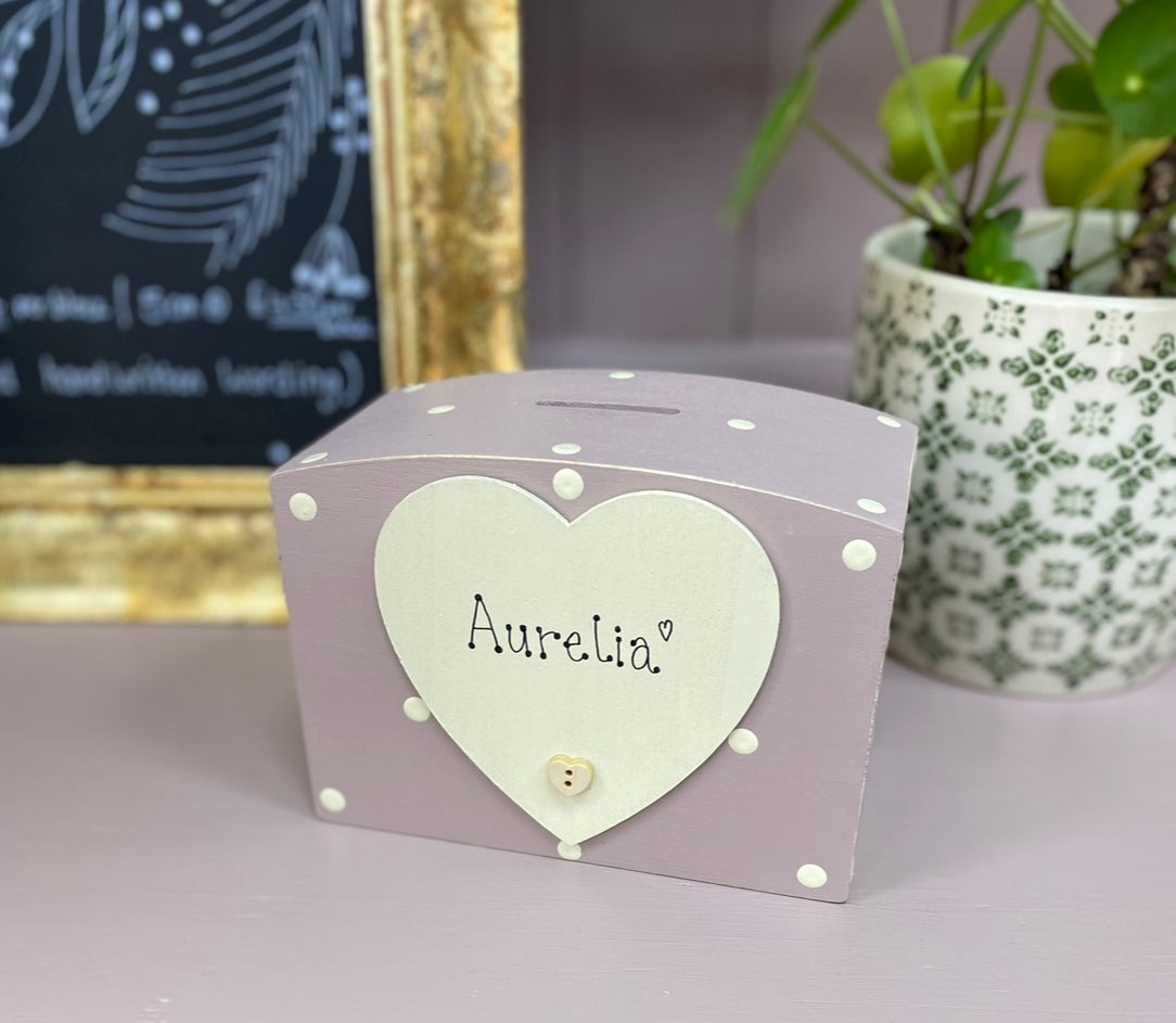 Personalised spotty wooden money box with heart.