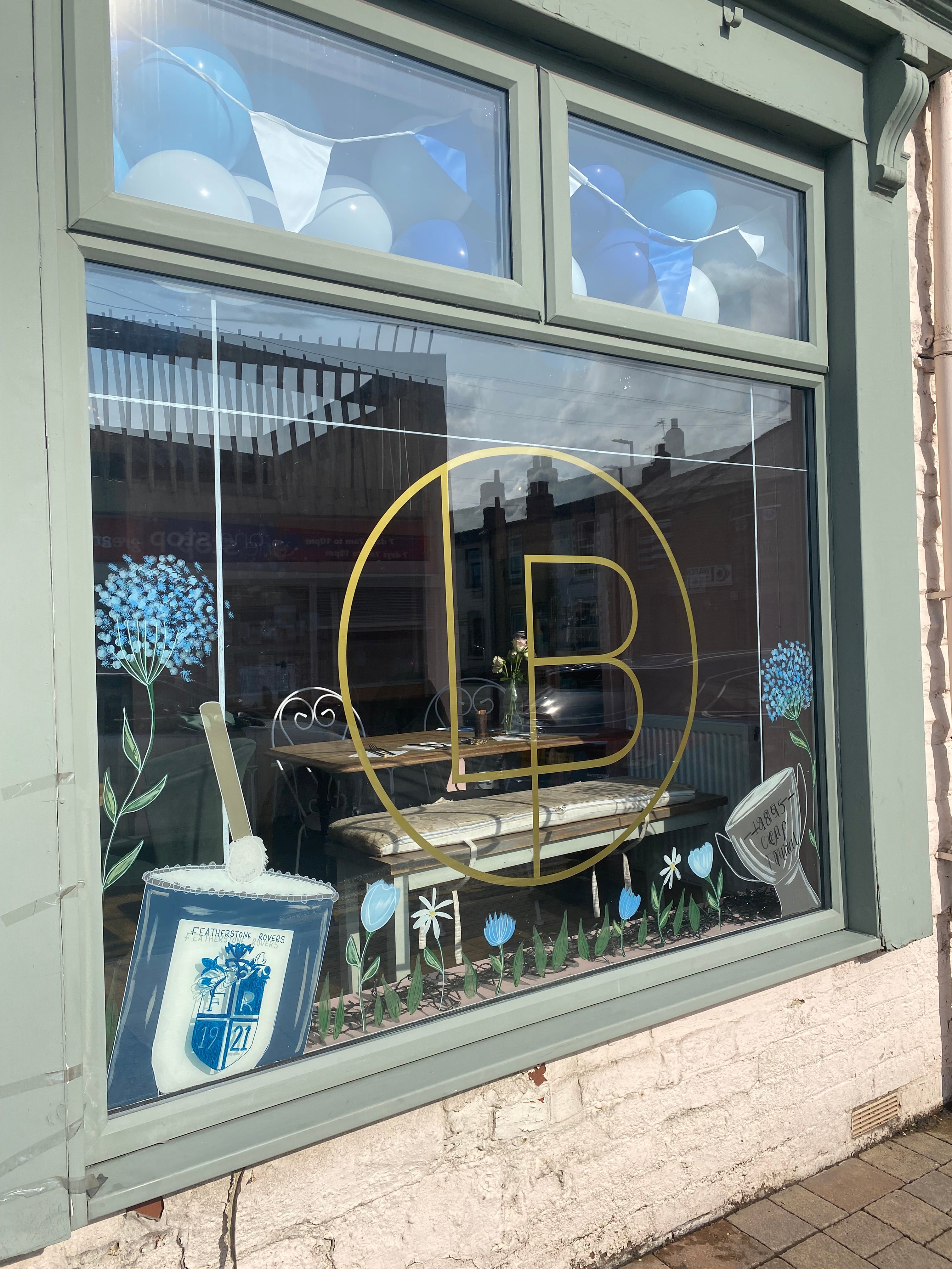 Custom Hand-Painted Window Art | Bespoke Window Designs for Homes & Shops & Business